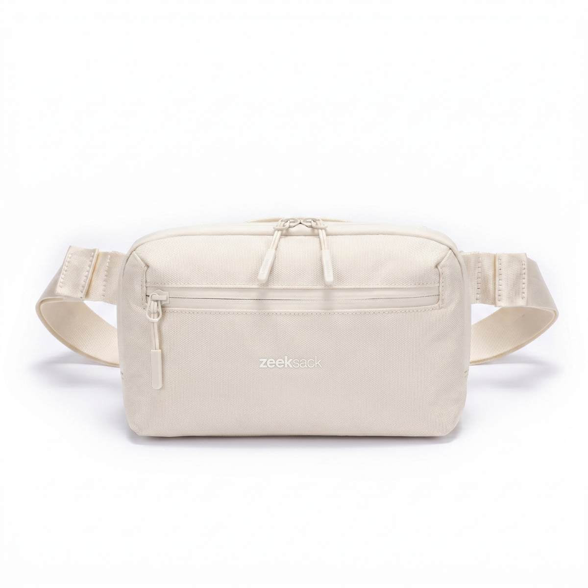 Zeeksack Crossbody Organizer (sandfarget) – skulderrem og frontlomme med glidelås.